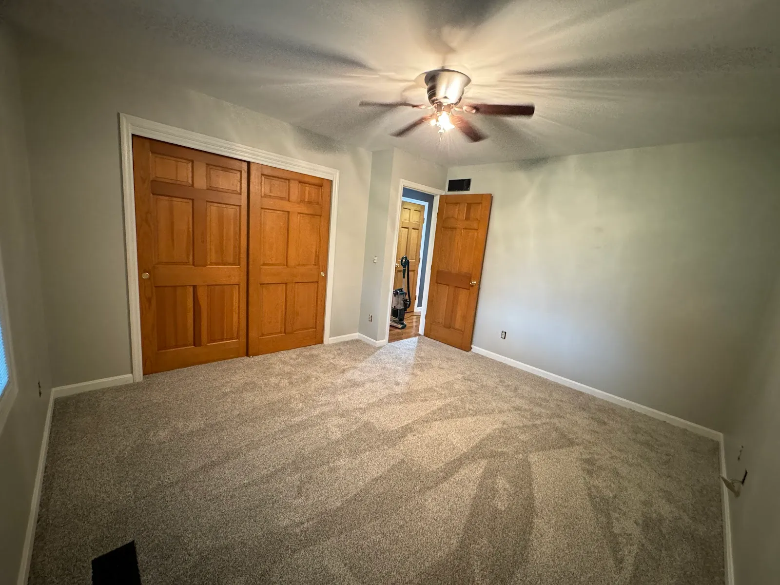 Newly installed bedroom carpet in a customer's home